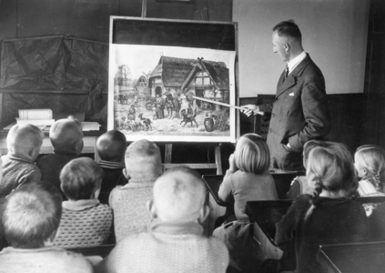 Teaching in a school class, 1933 (b/w photo)