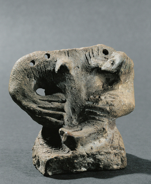 Woman holding a child (terracotta)