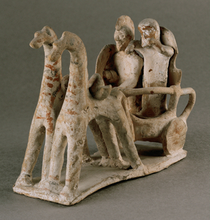 Two warriors with helmets and shields in a horse-drawn chariot …