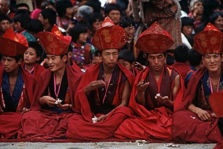 Buddhist monks at the Paro Tshechu, mask dance festival, in the Paro Dzong, Bhutan (photo)