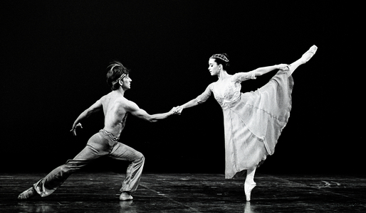 Trinidad Sevillano and Julio Bocca performing a pas de deux in 'Le Corsaire' - English National Ballet (London Festival Ballet). London Coliseum, 18 July 1988 (b/w photo)