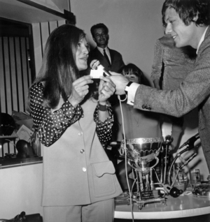 Singer Dalida during Drawn For Semifinal of Football Cup during Radio Program "Rtl Non Stop" With Presenter Fabrice April 11, 1969 (b/w photo)