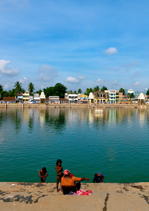 Children Taking A Bath Under The Supervision Of Their Mother In The Mahamaham Tank, Kumbakonam, India, 2008 (photo)