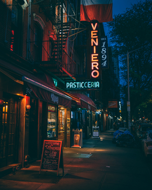 Veniero's Pasticceria vintage neon sign at night, in the East Village, Manhattan, New York, USA (photo)