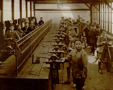 Machinery lesson, France, 1920 (sepia photo)