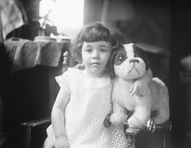 Young Girl with Toy Dog, Portrait, 1922 (b/w photo)