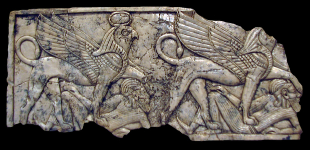 Iraq/Mesopotamia: Ivory plaque showing two griffins trampling fallen opponents. Neo Assyrian, Nimrud, c. 8th century BCE