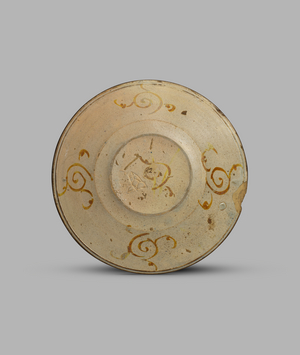 Lustred dish or tondino with putto running in a stony landscape, c.1530 (tin-glazed earthenware (maiolica))