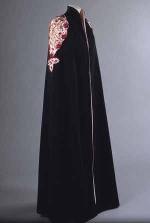 Woman's evening cape, Spring 1937 (fulled wool, silk taffeta, metallic thread embroidery, glass buttons)