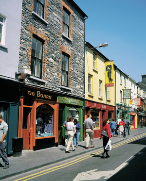 Killarney, Co Kerry, Ireland; People Walking Through A Town (photo)