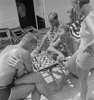 Men and women aboard a ship, 1930s (photo)