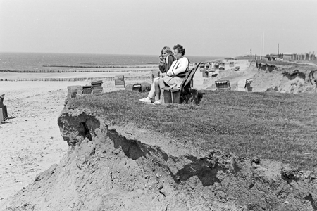Mother and daughter at the beach of Foehr island, Germany 1960s