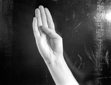 Letter B in finger alphabet (b/w photo)
