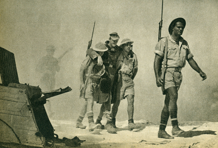 The Battle of Egypt, October 1942. Australian soldiers bring in a wounded prisoner (photo)