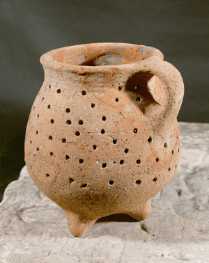 Three-legged cult vessel, tripod, perforated pottery from Jerusalem