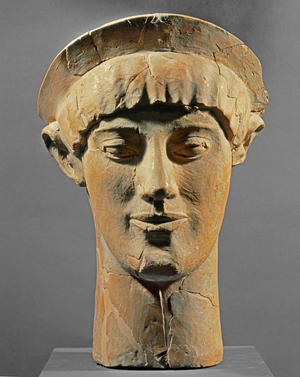 Archaic head of a kouros (terracotta)