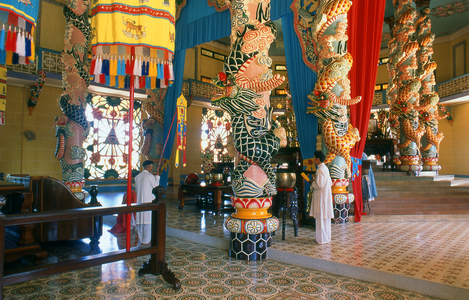 Vietnam: Cao Dai priests inside the main temple at the Cao Dai Temple, Cao Dai Holy See, Tay Ninh Province