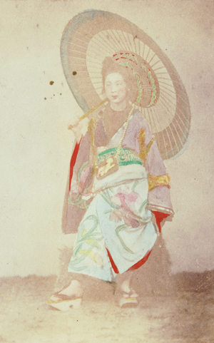 Woman with an umbrella, 1862-1868 (photo)