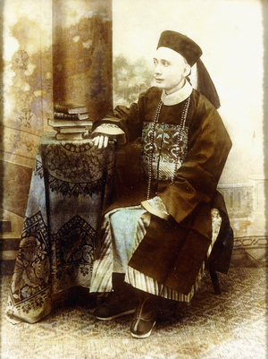 Portrait of a Mandarin, probably Cantonese, circa 1890s, c.1890s (crystoleum print, gilt surround, folding morocco case)