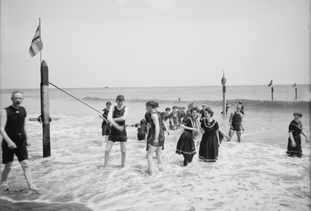 Group of People Enjoying Ocean Beach, Coney Island, New York City, USA, c.1900 (b/w photo)