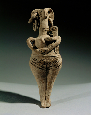 Nude female idol holding a child …