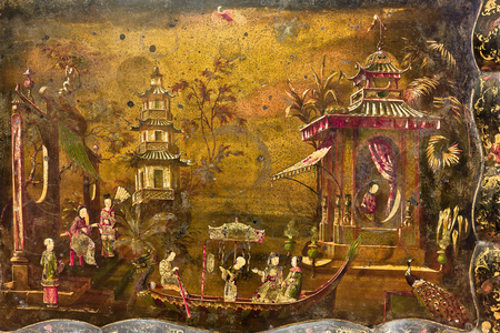 A tea table, detail of the top where there is a landscape with scenes of life in imitation of Chinese lacquers