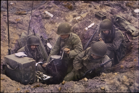 U.S. Soldiers Powering Radio Set using GN-45 Hand Crank Generator, Pointe du Hoc, Normandy, France, June 1944 (photo)