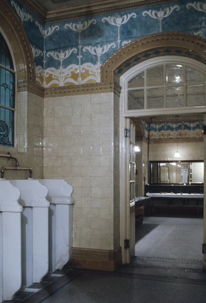 Arched door to the wash basin room, Gentlemen's Cloakroom, The City Club, Old Broadway Street, London (photo)