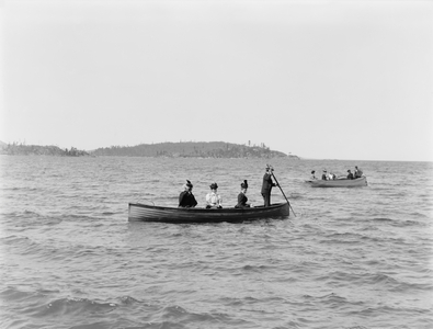 Group of People Boating off Presque Isle, Lake Superior, Marquette, Michigan, USA, c.1895 (b/w photo)