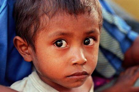 Refugee child in Sare, 1999 (photo)