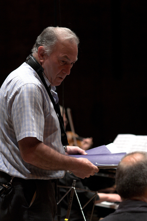 Northern Sinfonia orchestra manager arranges music sheets in Snape Maltings during the Aldeburgh Festival, 1 June 2005