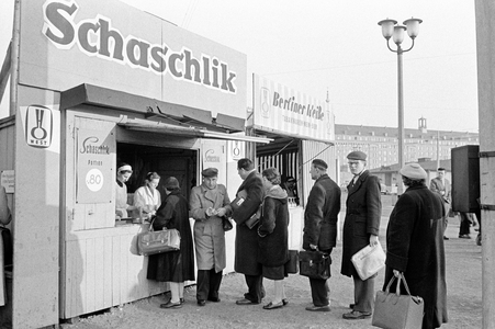 People queuing up for shashlik, burger balls on a wooden spit …, 1959 (photo)