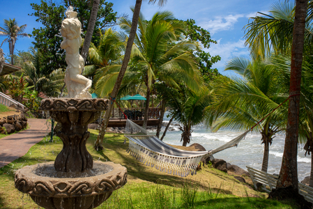 Hammock and fountain at Casa Canada hotel on Big Corn Island, Nicaragua, Central America, America (photo)