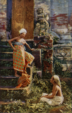 Balinese girls talking among ruins (colour photo)