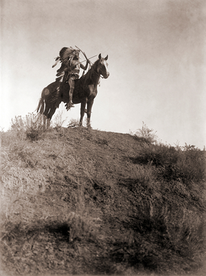 Absaroke Warrior on Horseback by Edward S. Curtis, c.1910 (silver print)
