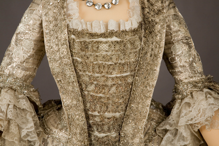 The Rockingham Mantua, c.1760-65 (silk satin brocaded in silver thread with silver lace trim)