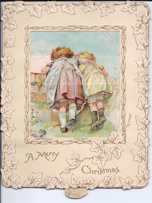 A Victorian embossed mechanical picture changing Christmas card of two girls looking over a brick wall, c.1880 (colour litho)