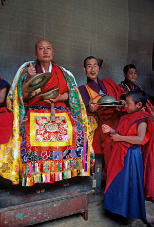 Buddhist monks at the Paro Tshechu, mask dance festival, in the Paro Dzong, Bhutan   (photo)