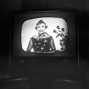 German TV presenter Angelika Feldmann from the NDR studios to a TV screen in Hamburg, Germany 1950s