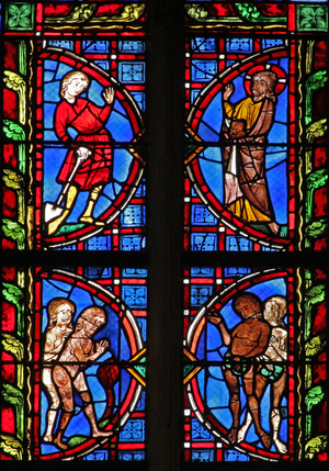 Window w30 depicting God with Adam carrying a spade; Adam and Eve try to hide their nakenness (stained glass)