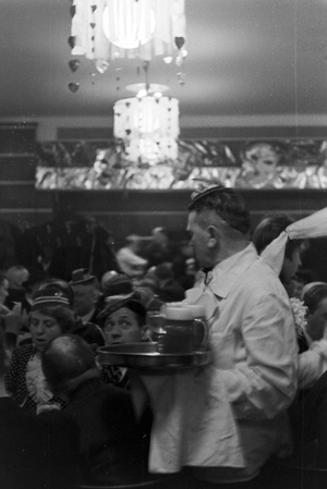 Amidst the carnival at Duesseldorf with the slogan "Lachendes Volk", Germany 1930s (b/w photo)