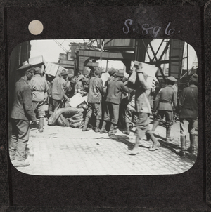 Unloading supplies at a French port, 1917 (lantern slide)