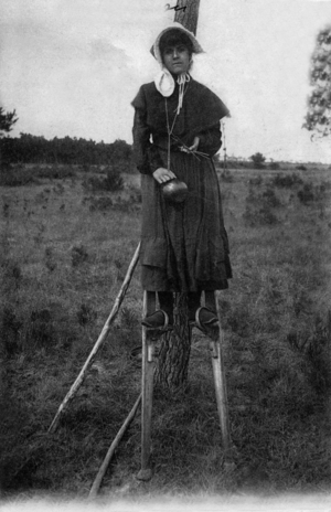 a woman on stilts in Arcachon (France), Postcard, c. 1912
