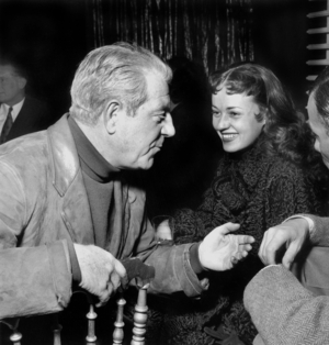 French Actors Jeanne Moreau and Jean Gabin on Set of Film Hands Off The Loot October 7, 1953 (b/w photo)