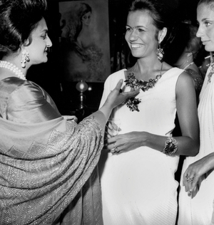 Party Given at Vagenende Restaurant in Paris : Maharani of Baroda Who Has The Most Beautiful Jewels in Paris and the Jeweller Irene Jacob June 17, 1966 (b/w photo)