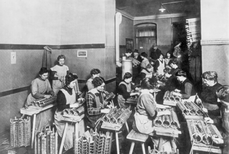 Women weaving bullet baskets, 1917 (b/w photo)