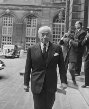French politician Paul Reynaud arriving at Matignon, Paris, for a meeting with General DeGaulle, June 12, 1958 (b/w photo)