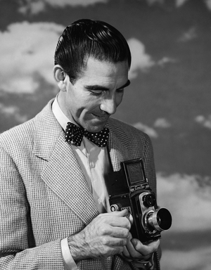 Photographer holding a camera
