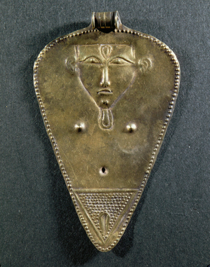 Pendant with a schematic representation of a woman, perhaps a fertility goddess