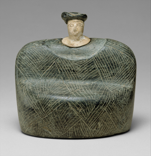 Shaft-hole axe head with bird-headed demon, boar and dragon, c. late 3rd–early 2nd millennium B.C. (alabaster)
